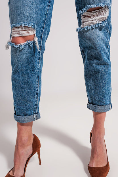 Asymmetric button detail jeans in mid blue