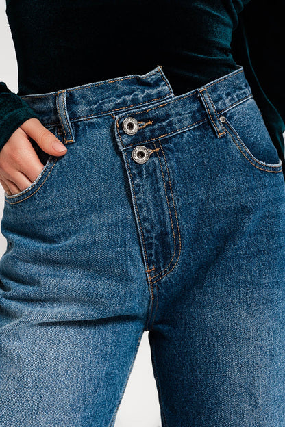 Q2 Asymmetric button detail straight jeans in mid blue