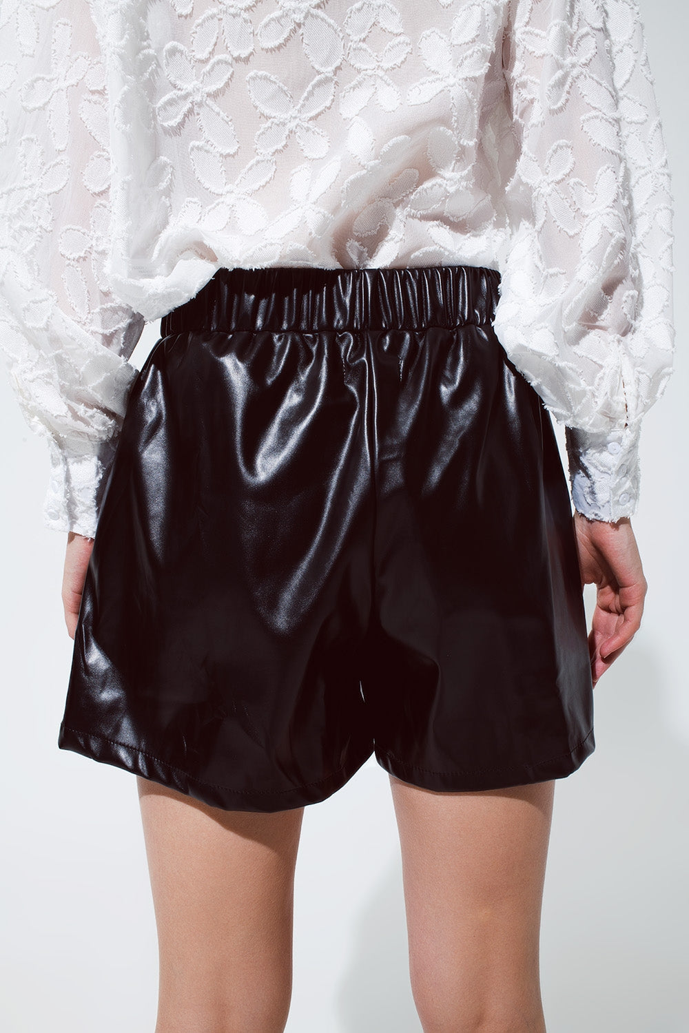 Black faux leather shorts