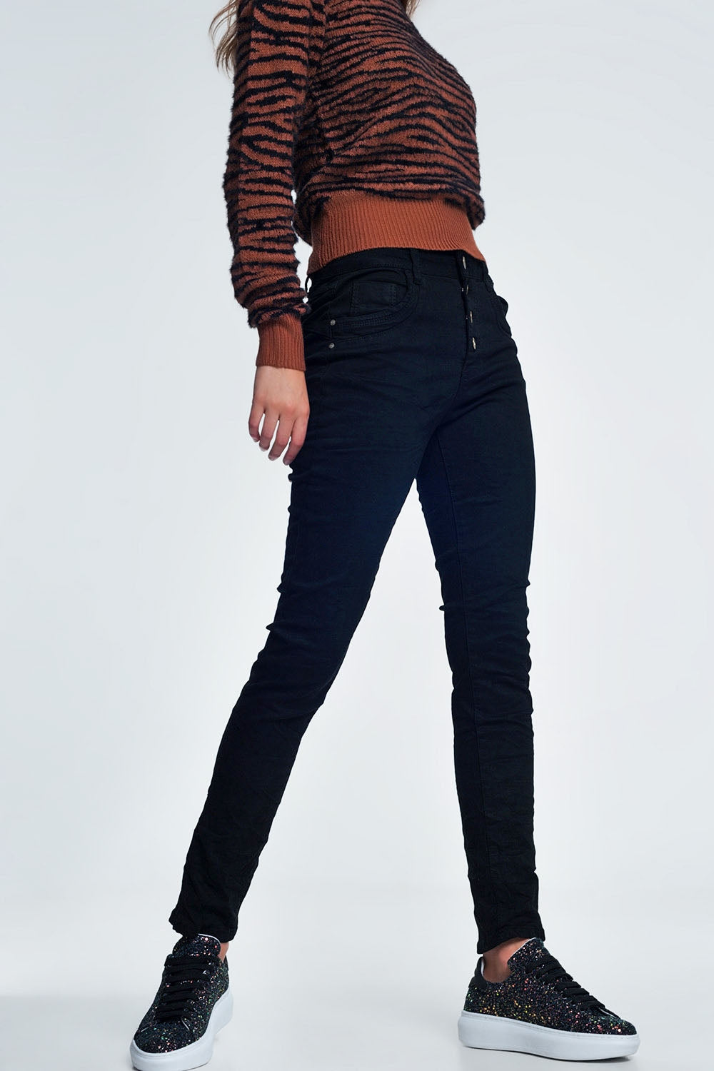 Black jeans with button closure