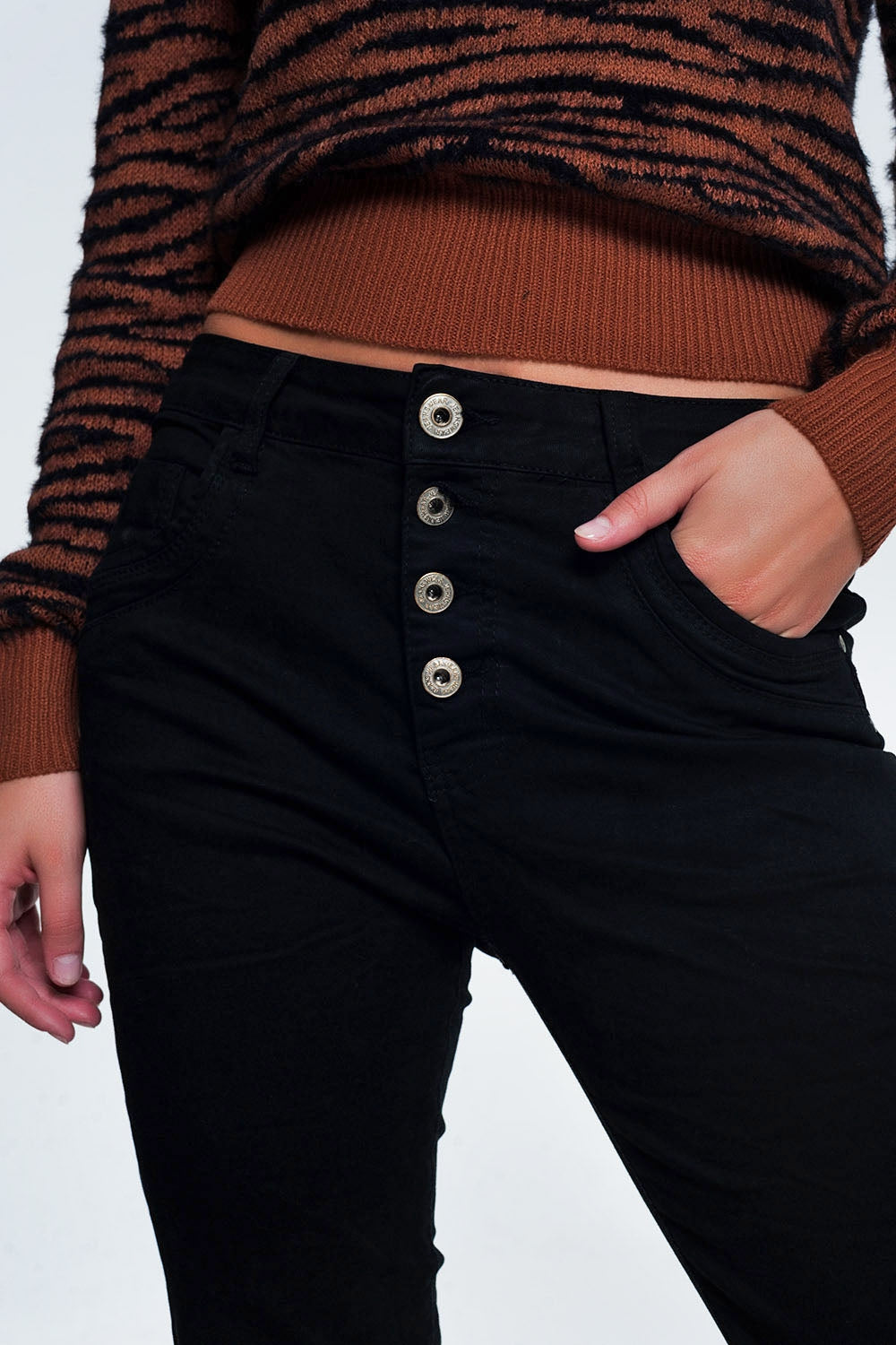 Black jeans with button closure