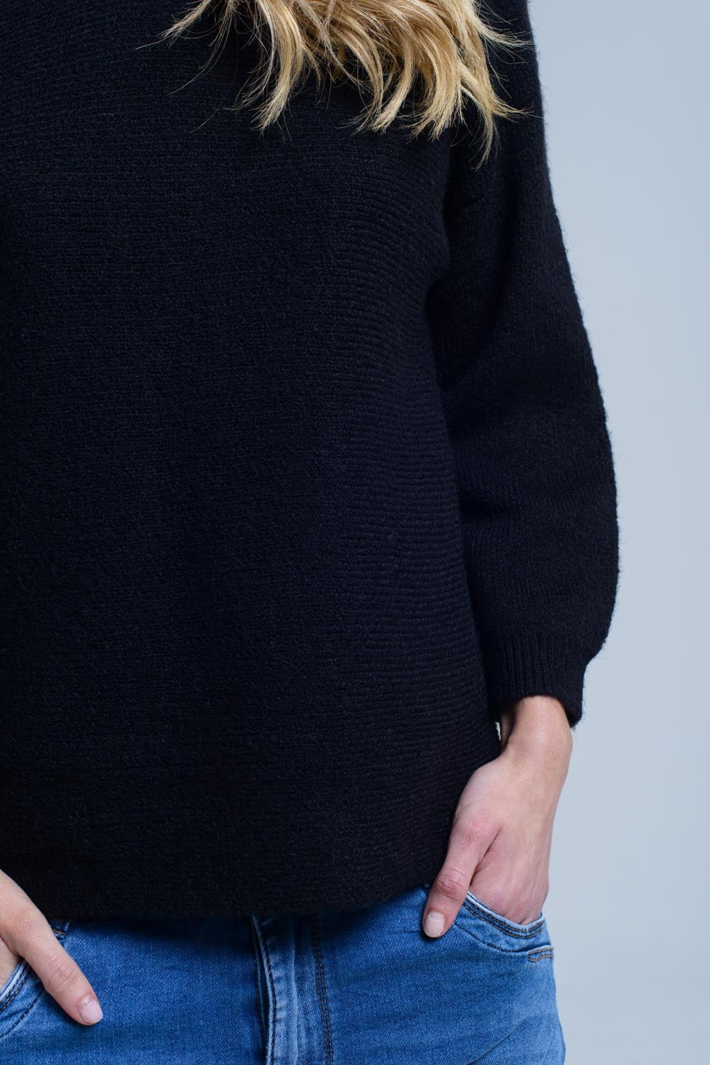 Black knitted crew neck sweater