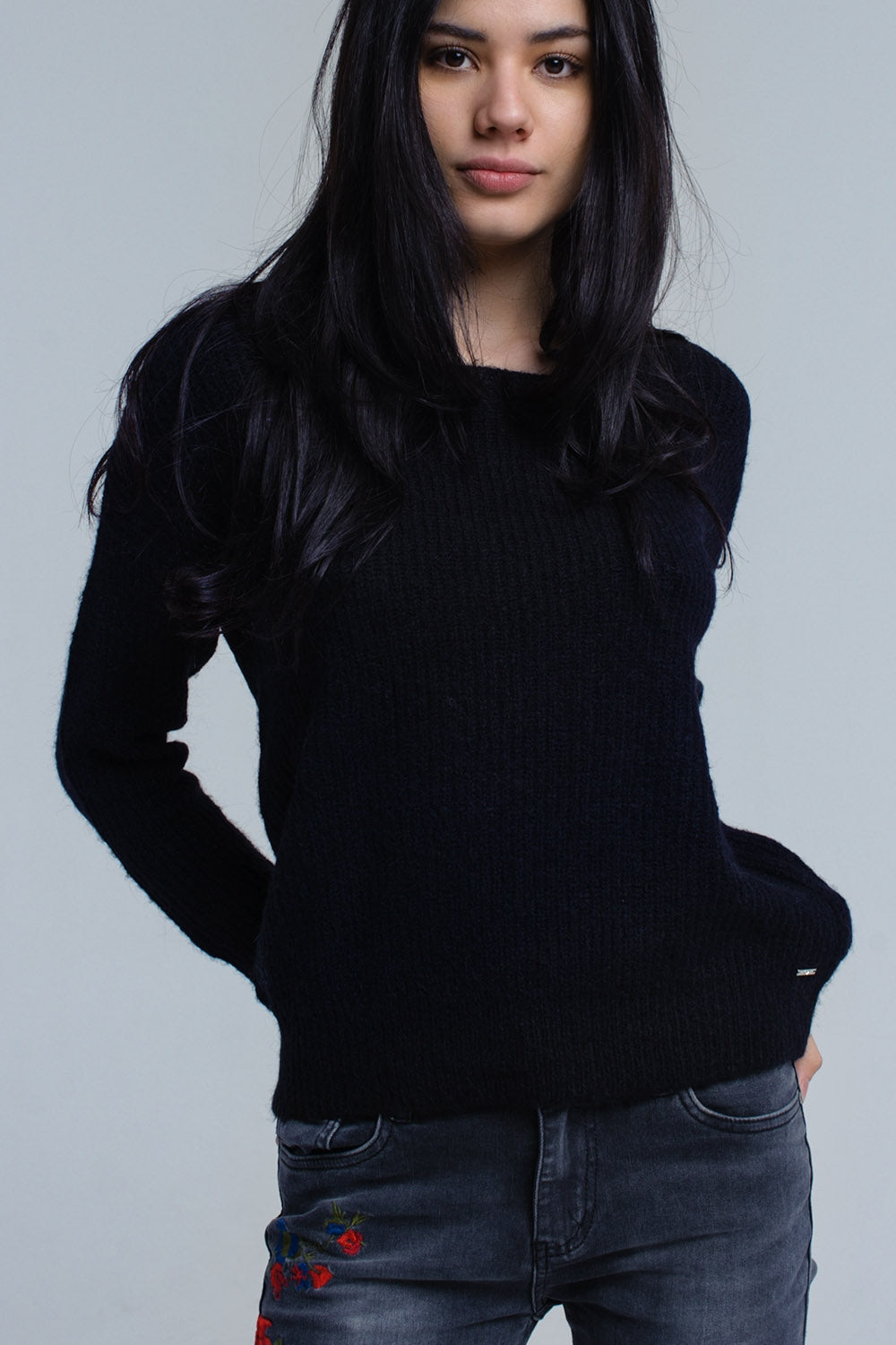 Black knitted sweater with tie-back closure