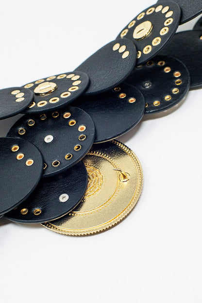 Black leather belt with black rhinestone round buckle and golden details