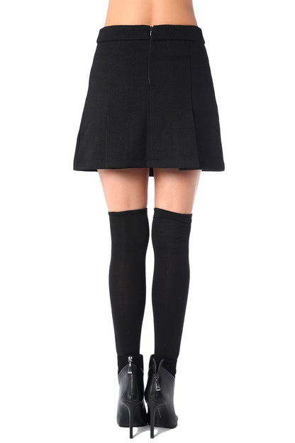 Black mini skirt with black button detail