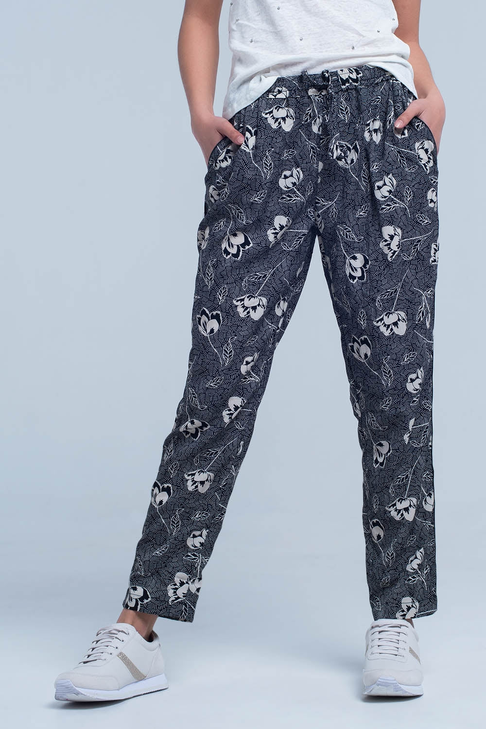 Black pants with floral print