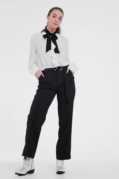 Black pants with wide legs and low hem