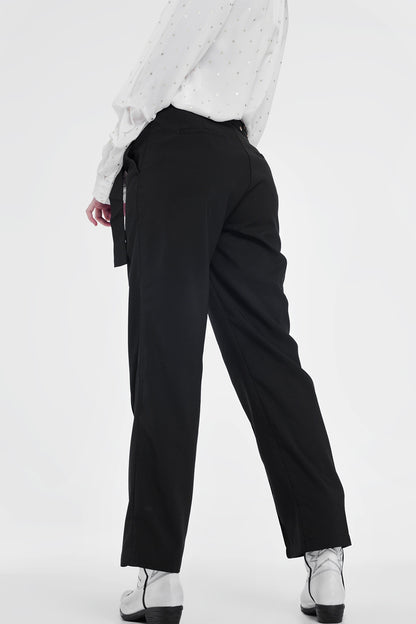 Black pants with wide legs and low hem