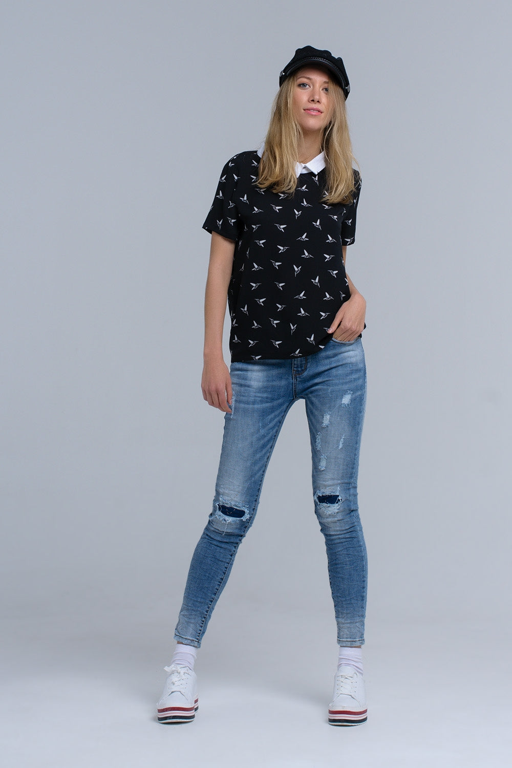 Black shirt with white printed birds