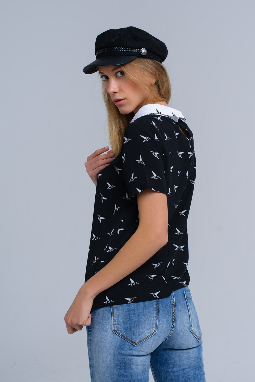 Black shirt with white printed birds