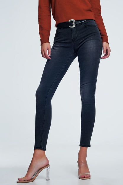 Black skinny jeans with shiny stones detail on the side