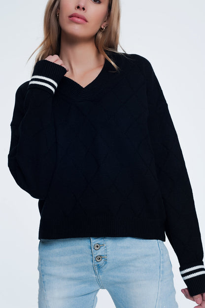 Q2 Black sweater with diamond pattern