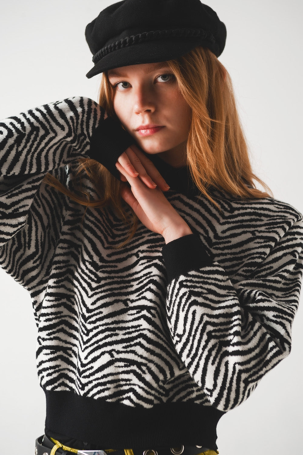 Black sweater with zebra pattern