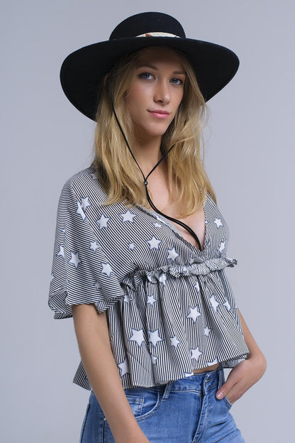 Q2 Black top with stars and ruffle