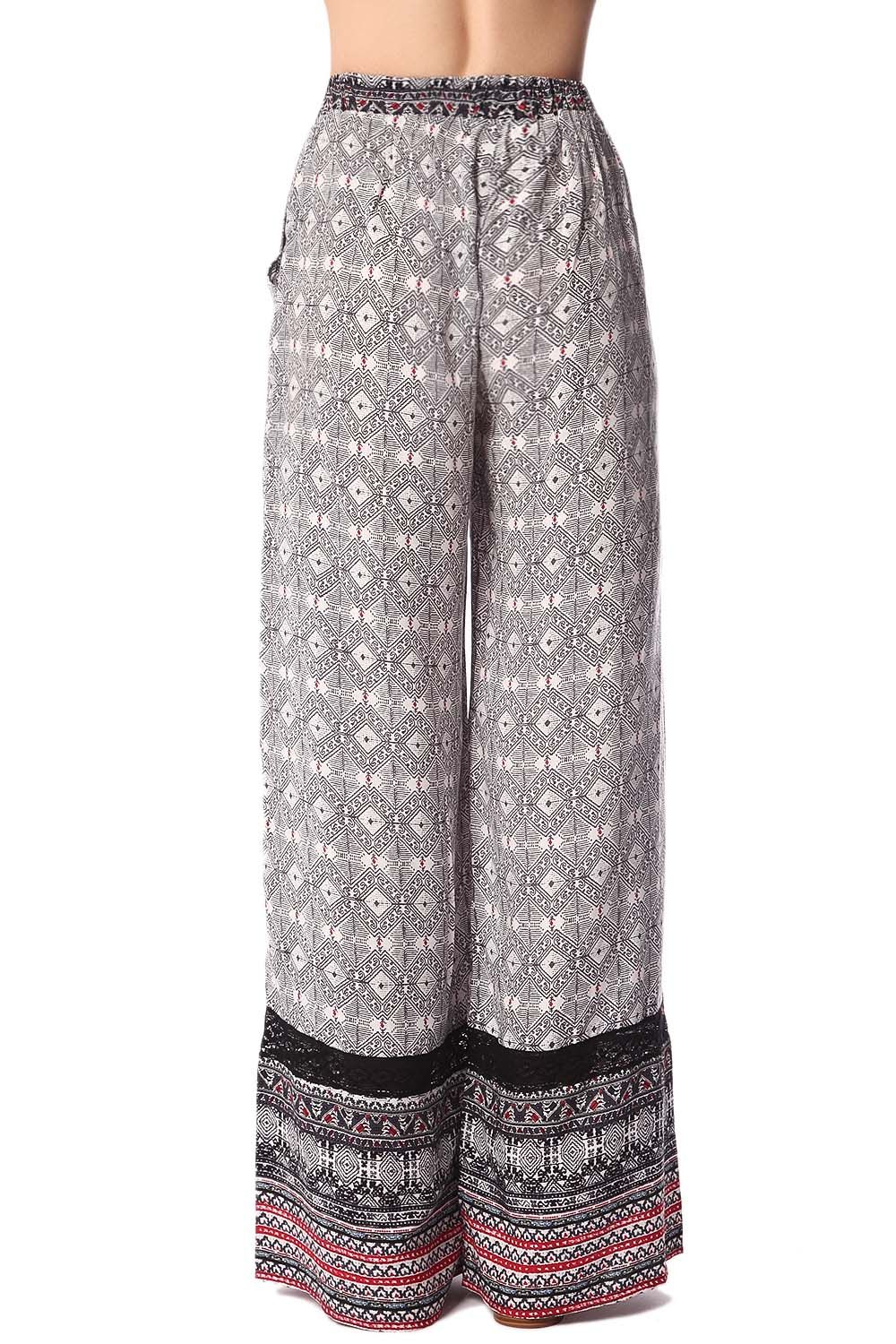 Black wide leg pants in ethno print with eyelash lace insert