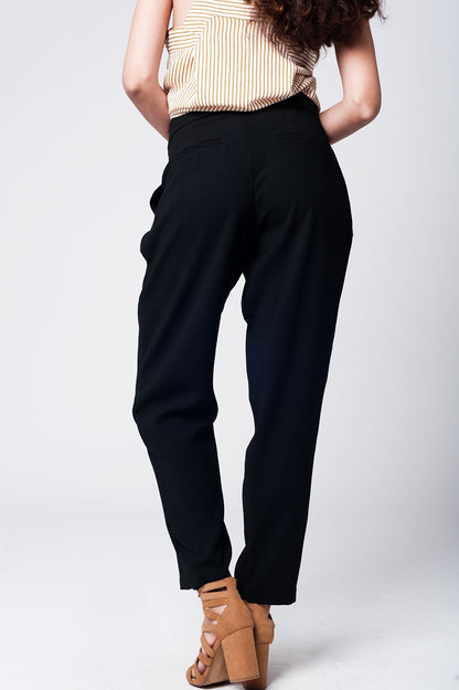 Black wide leg trousers with waist detail