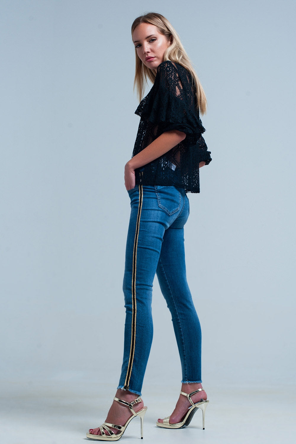 Blue denim pants with gold and black sideband