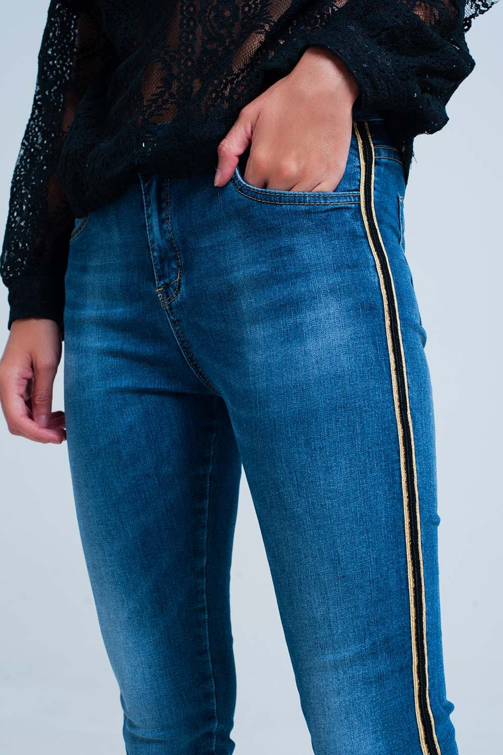 Q2 Blue denim pants with gold and black sideband