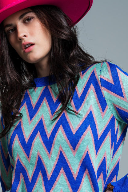 Blue sweater with  zig zag print in blue with pink details