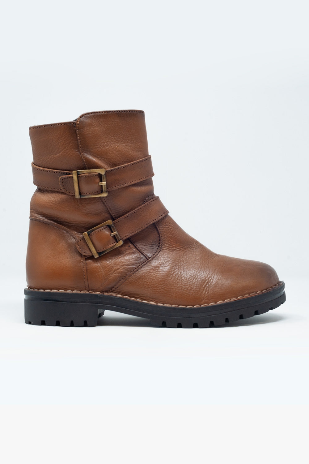 Q2 Brown buckled boots