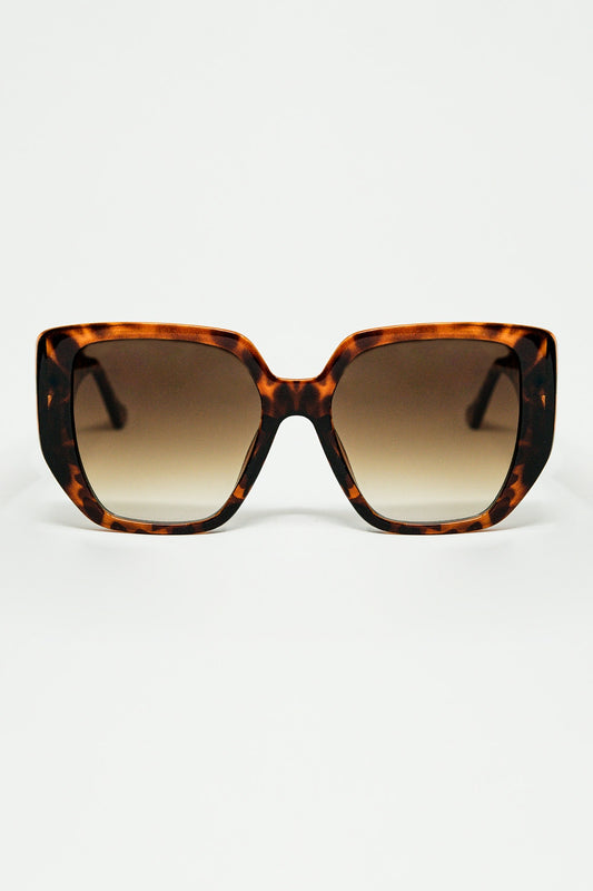 Q2 Brown pin-up style sunglasses with geometric design and cat eyes