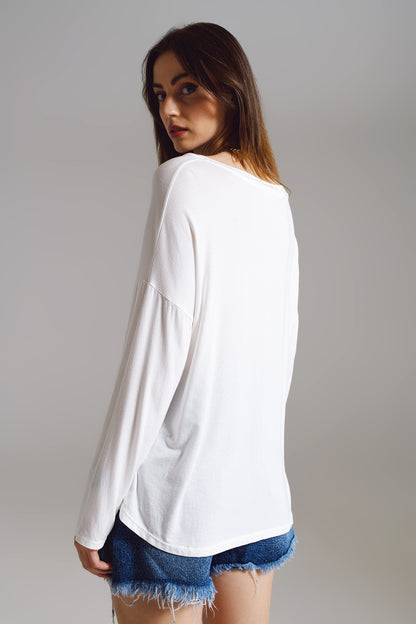 Cream long sleeve v neck top in modal