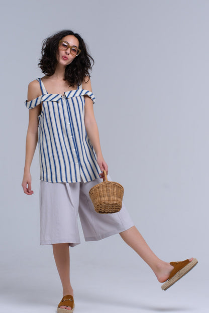 Cream top with blue stripes