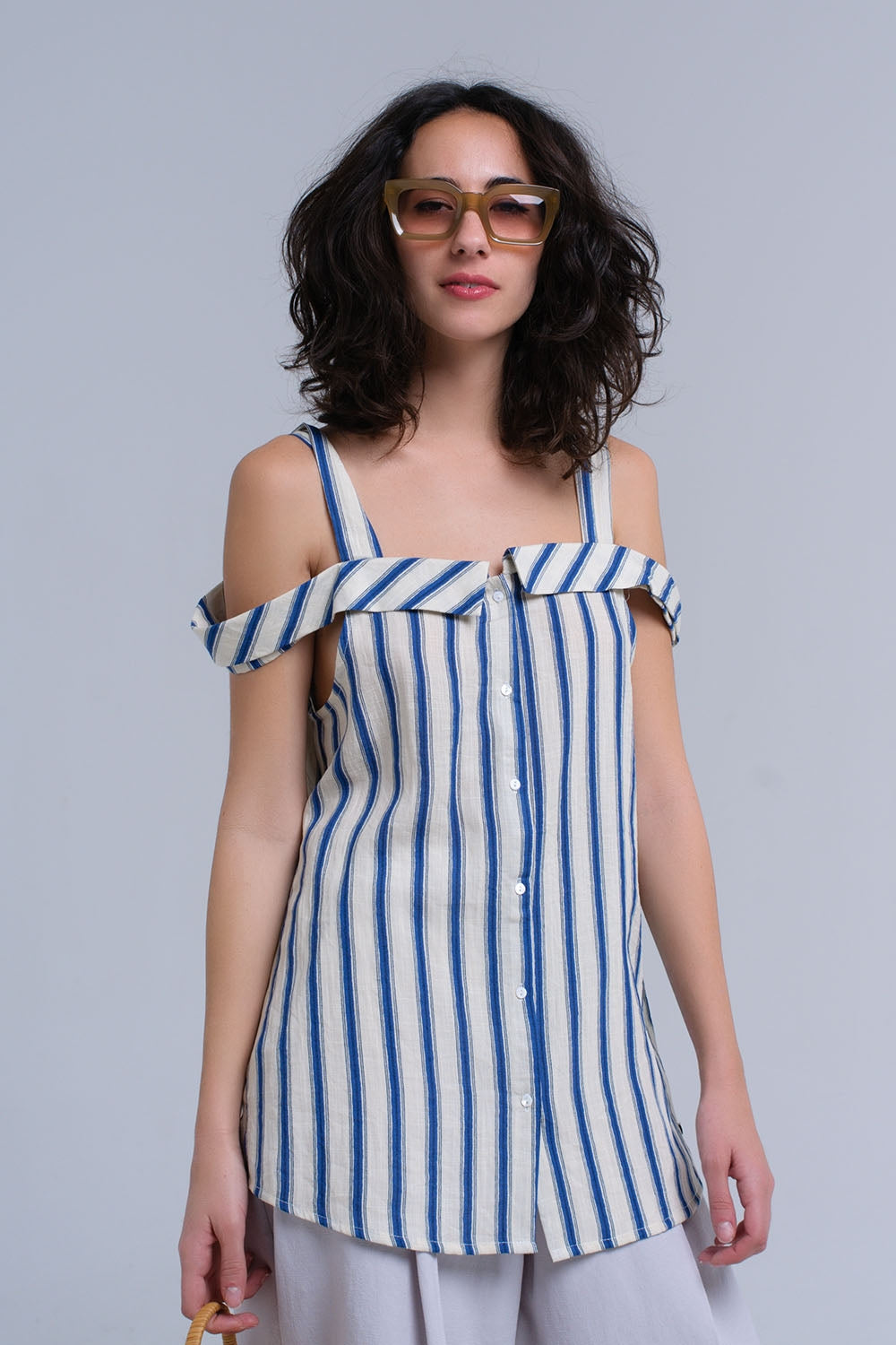 Cream top with blue stripes