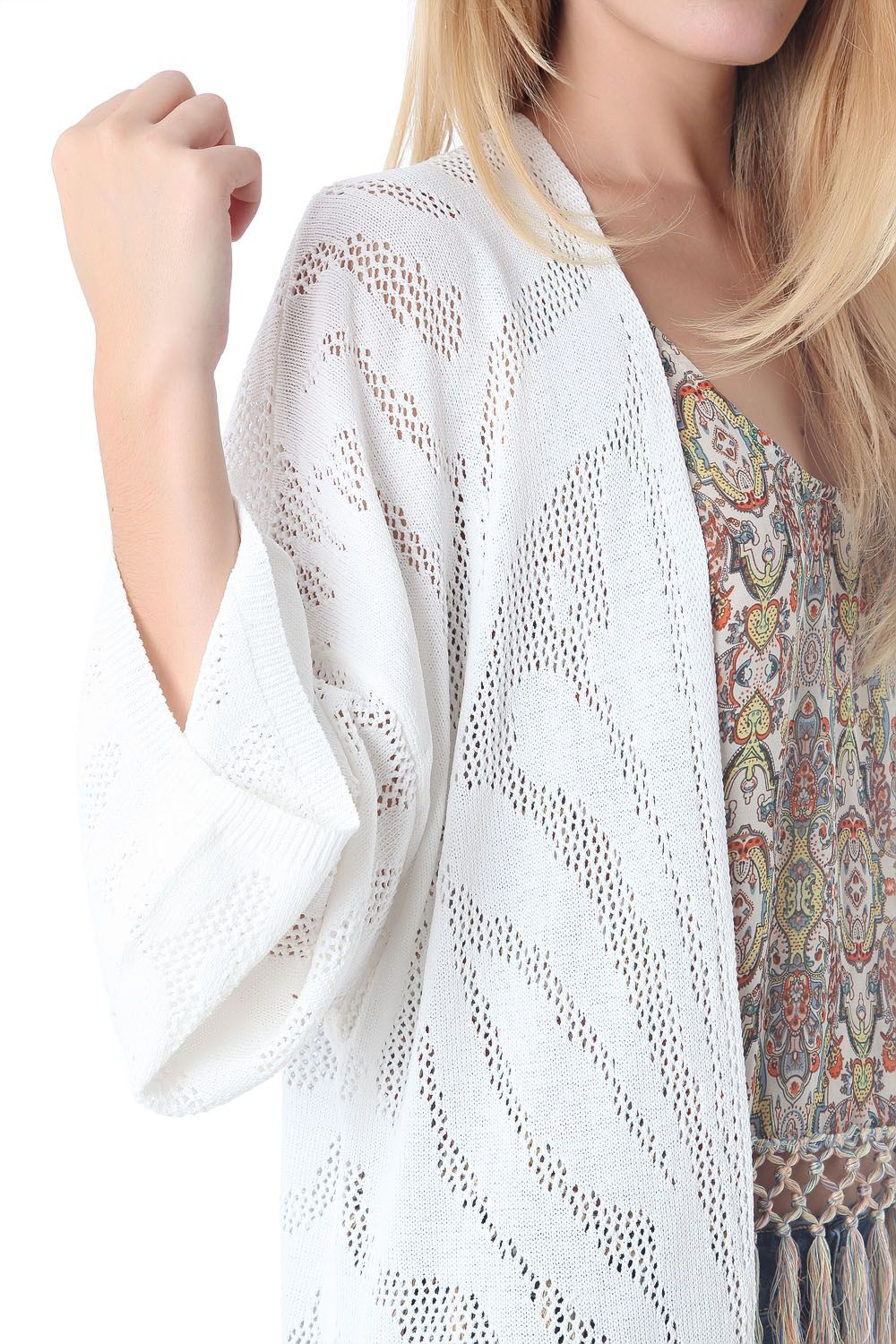 Crochet longline jacket with tassel trim hem