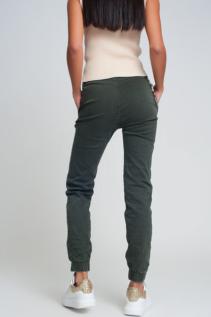 Cuffed utility pants with chain in khaki