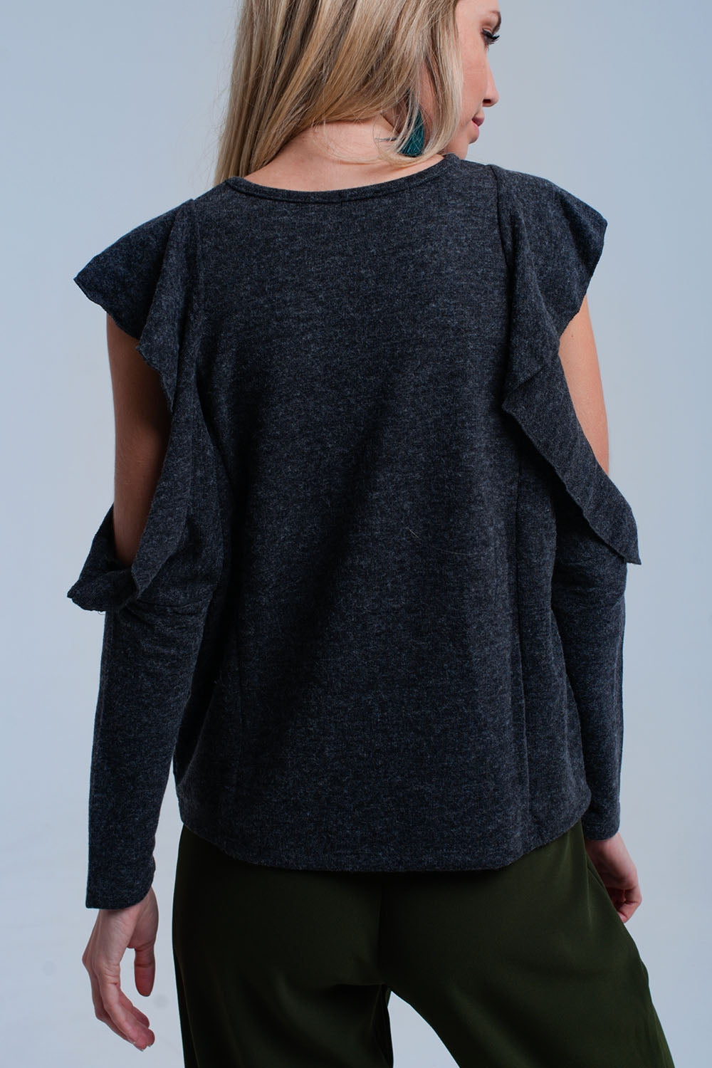 Dark gray top with ruffle and open detail