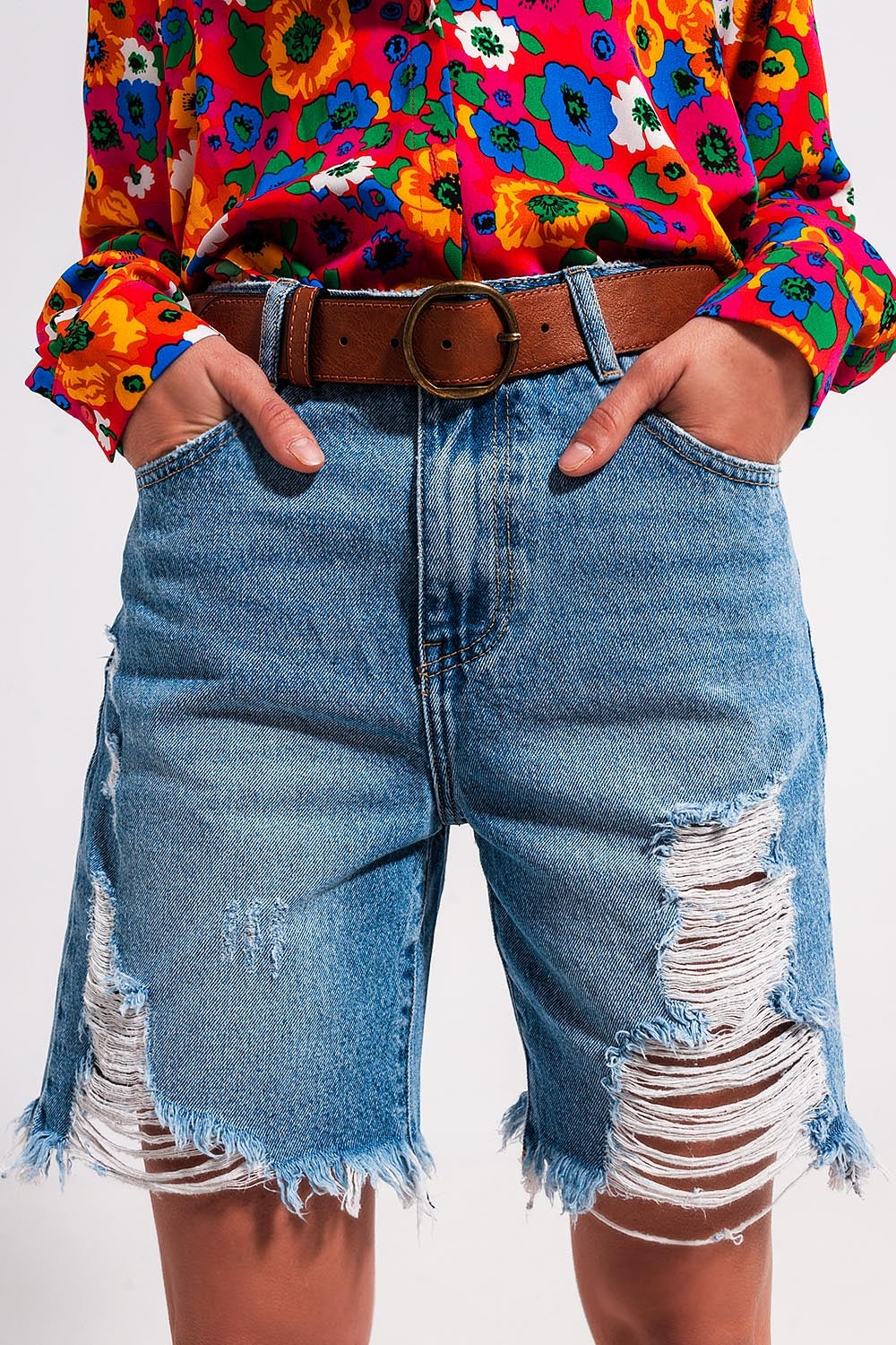 Denim shorts with distressing in light blue