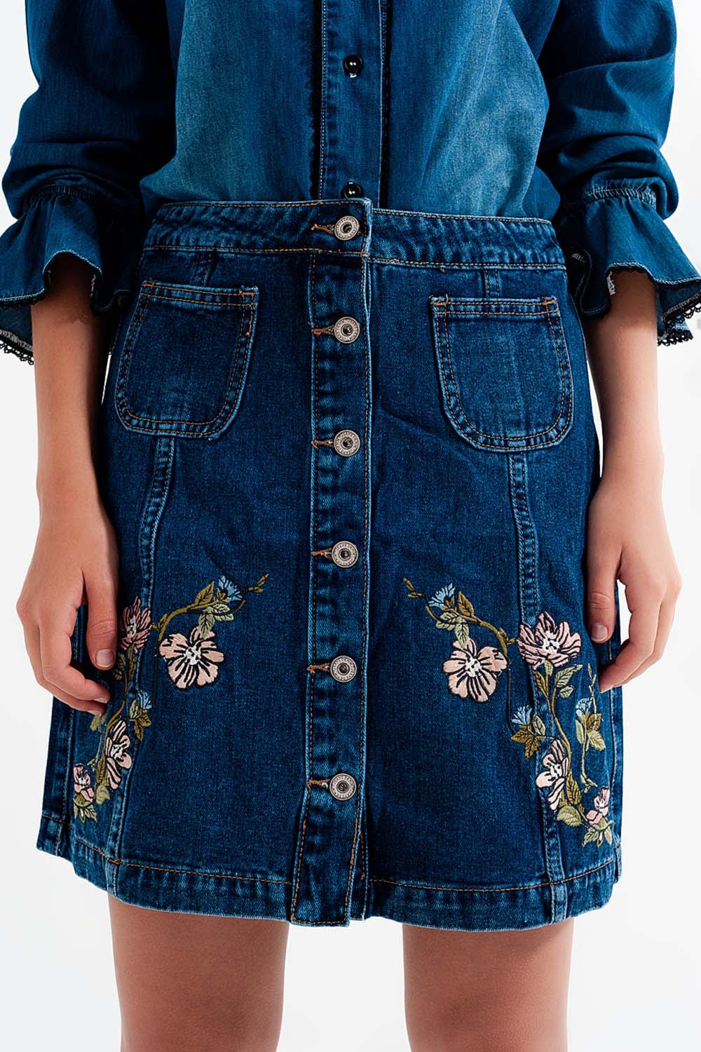 Denim skirt with flower embroidery and front buttons