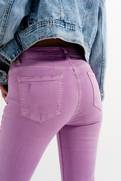 Distressed raw hem skinny jeans in lilac