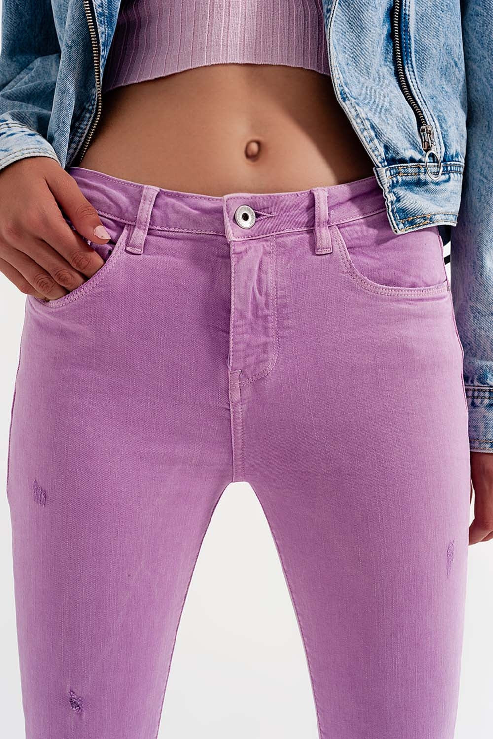 Distressed raw hem skinny jeans in lilac