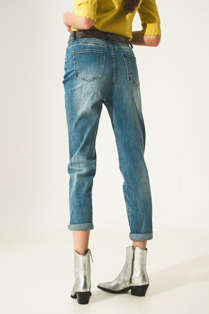 Distressed straight leg jean in light blue