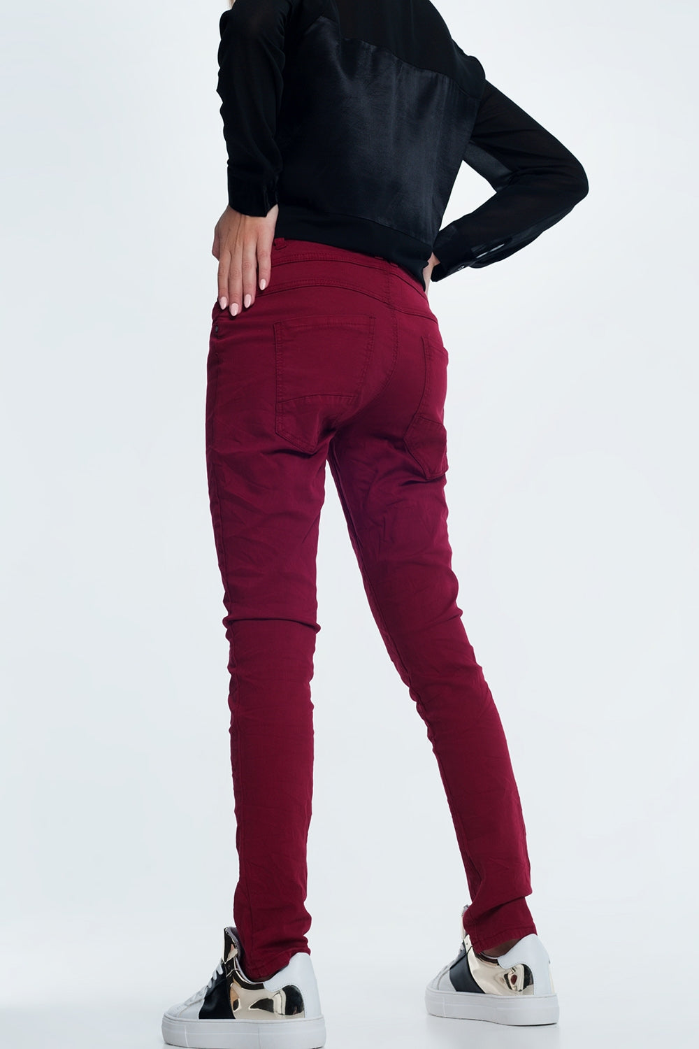 Drop crotch skinny jean in maroon