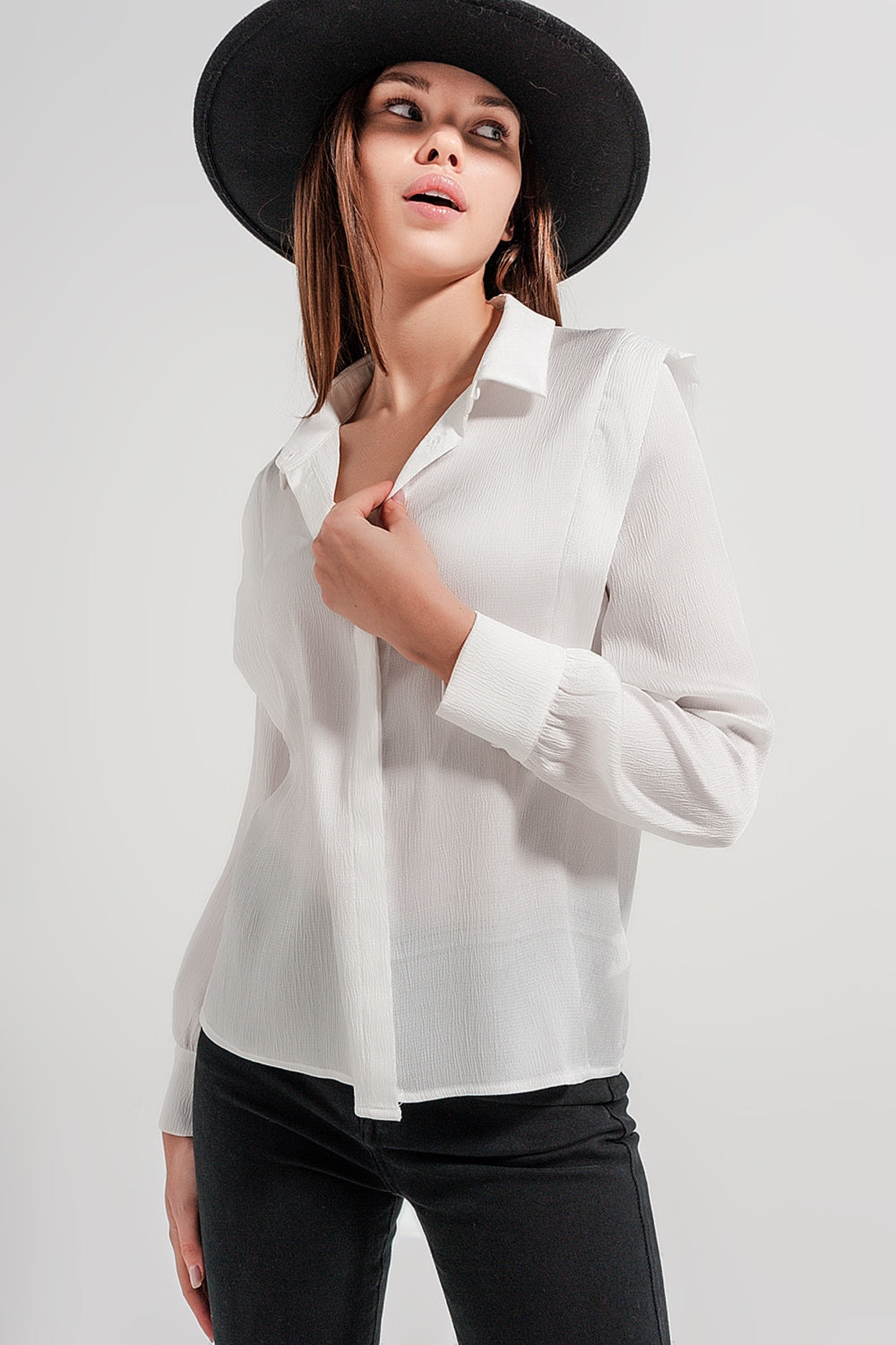 Ecru blouse with ruffle details