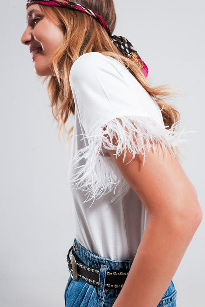 Embellished top with faux feather cuffs in white