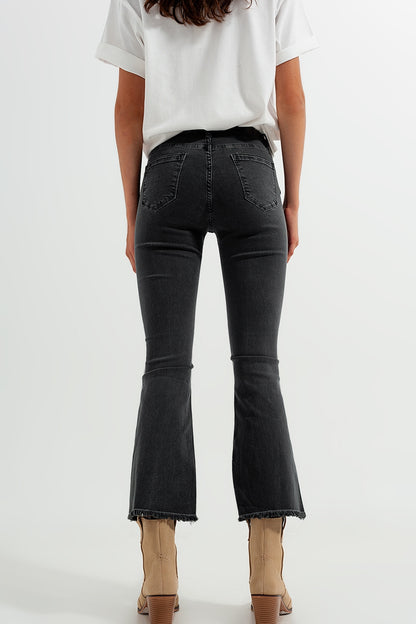 Flare jeans in dark grey with asymmetric detail