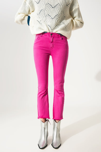 Flare jeans with raw hem edge in fuchsia