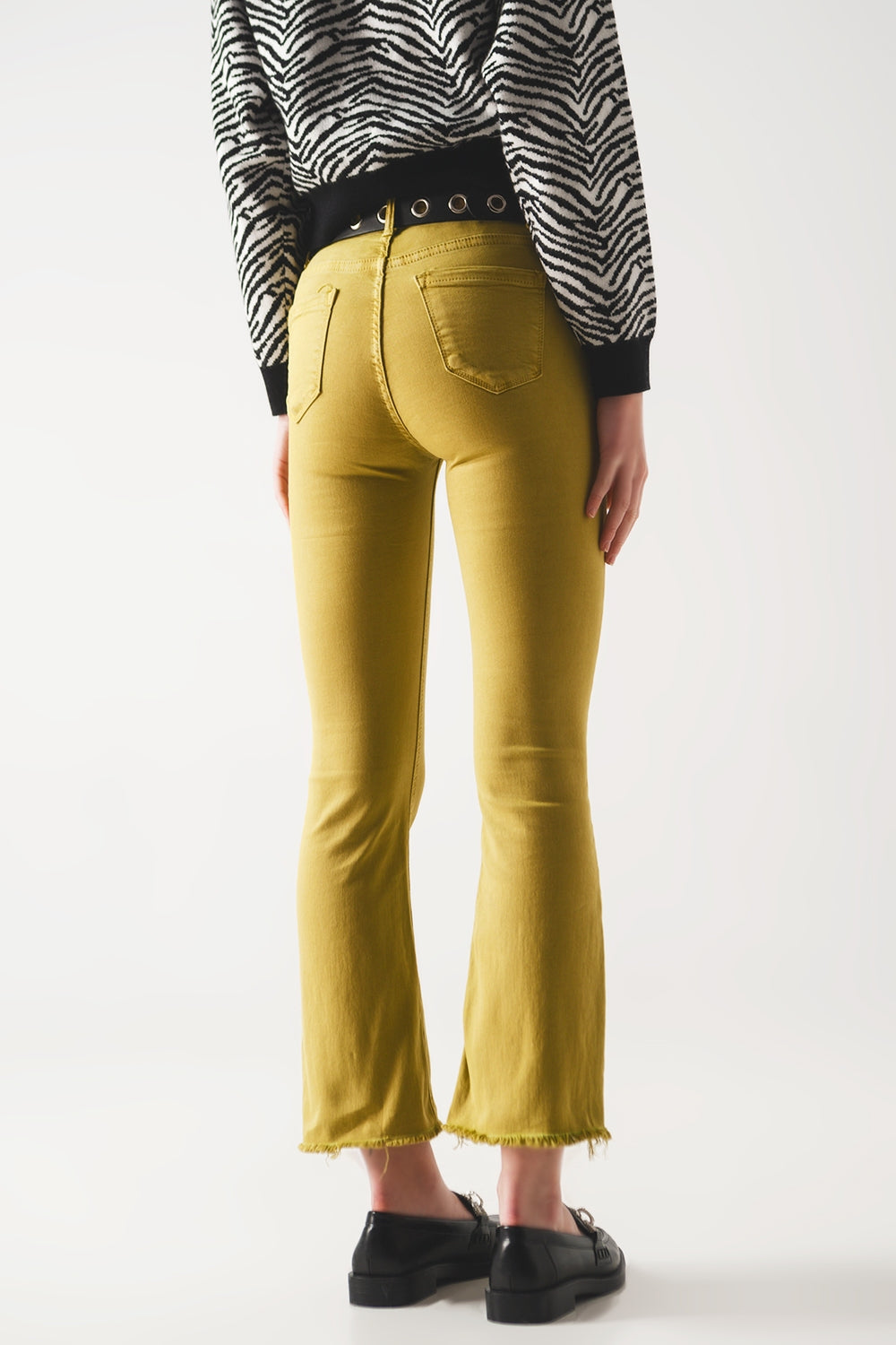 Flare jeans with raw hem edge in green