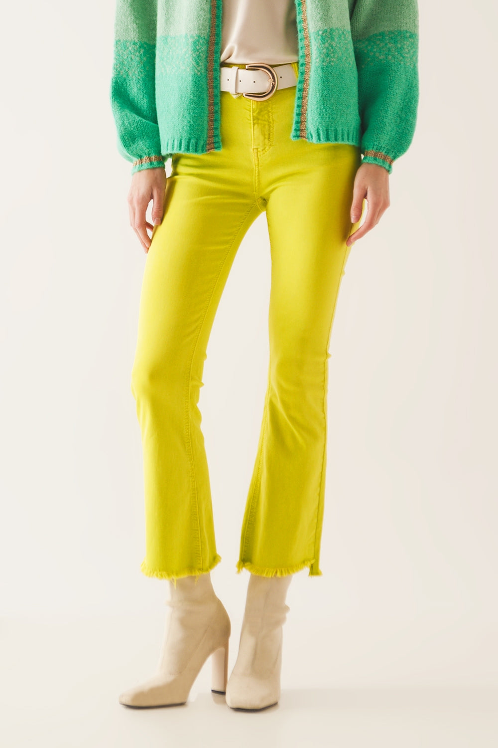 Flare jeans with raw hem edge in yellow