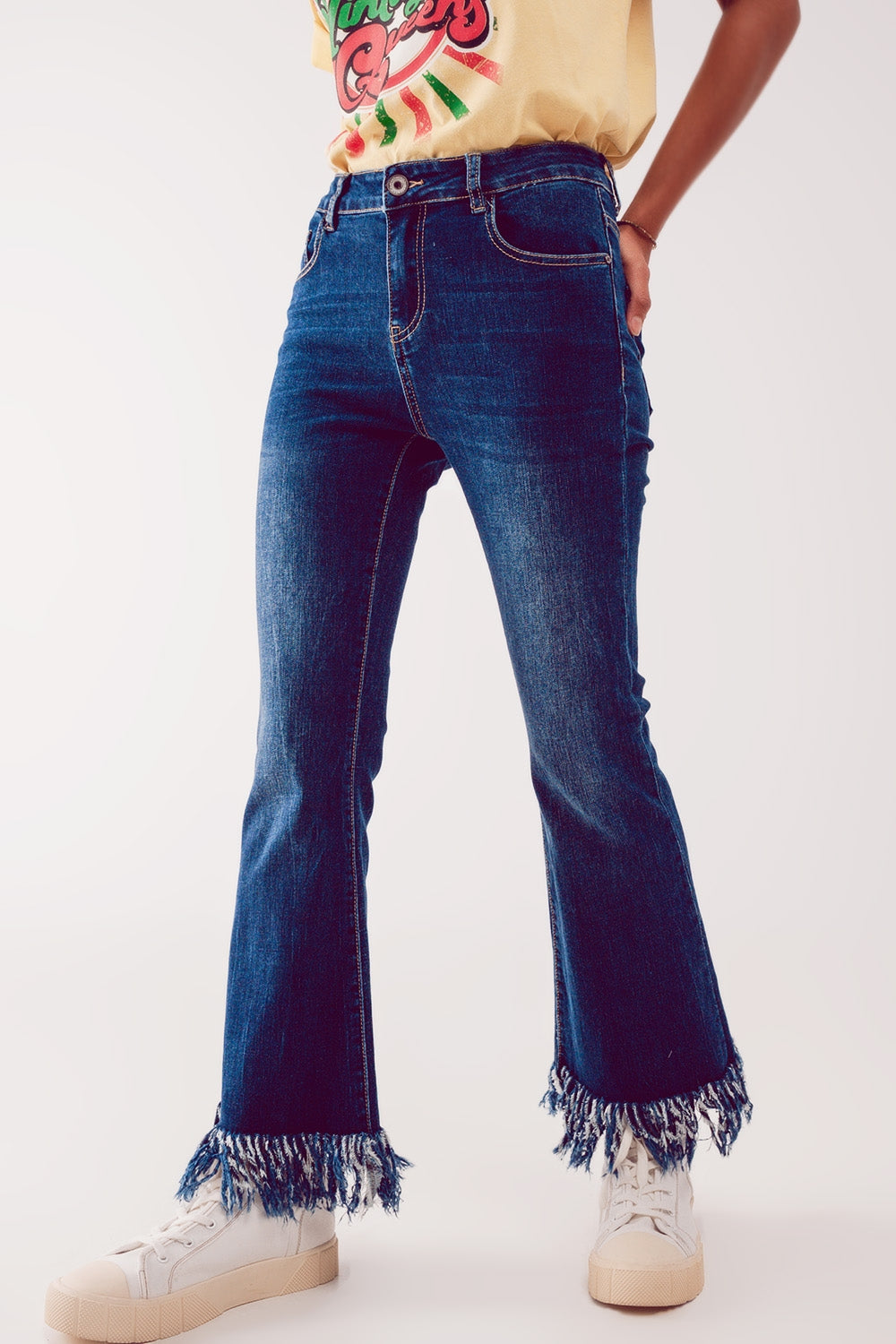 Flare straight leg jeans with raw hem edge in deep blue