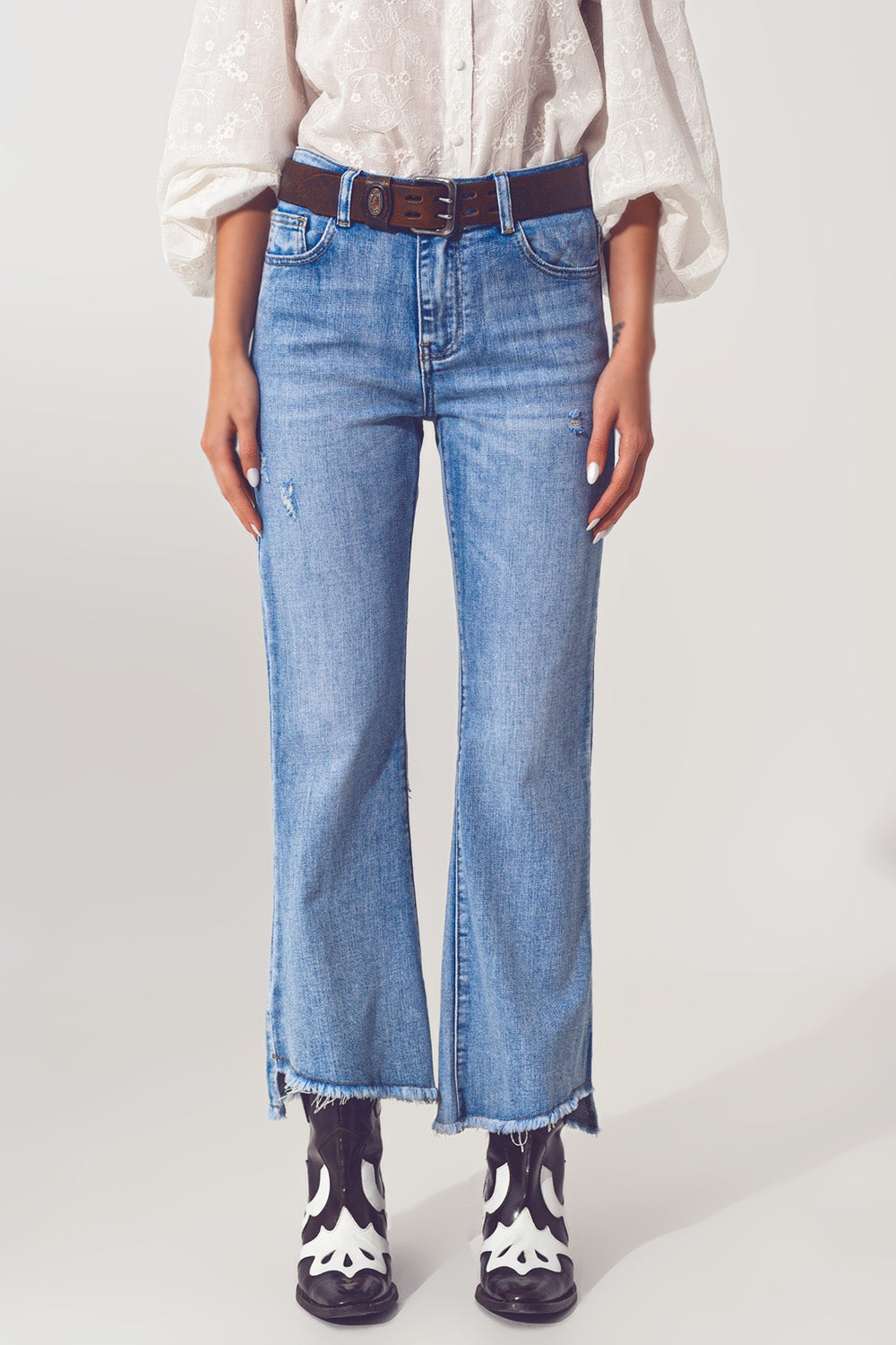 Q2 Flared Jeans in Light Blue with Asymmetric Hem