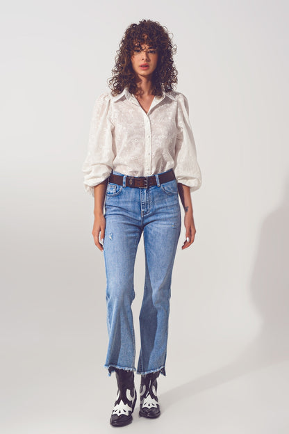 Flared Jeans in Light Blue with Asymmetric Hem