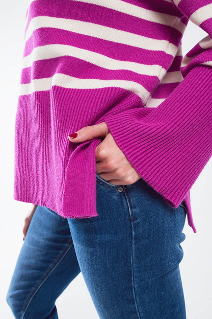 Fuchsia oversized trutleneck sweater with white stripes and splits on the side