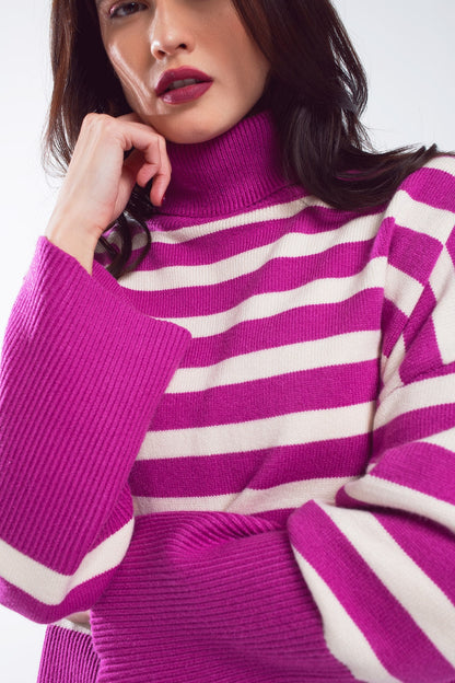 Fuchsia oversized trutleneck sweater with white stripes and splits on the side