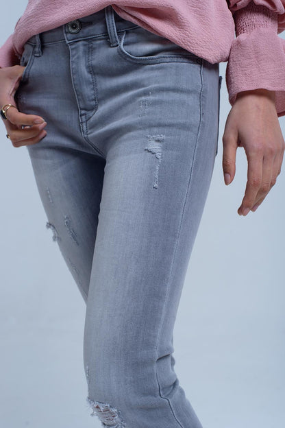 Gray jeans with rips detail