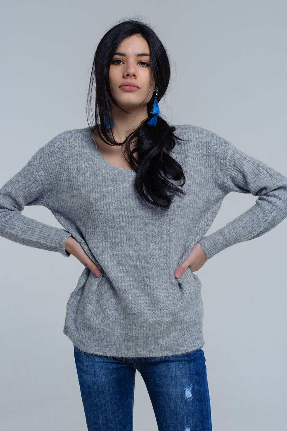 Gray knitted sweater with tie-back closure